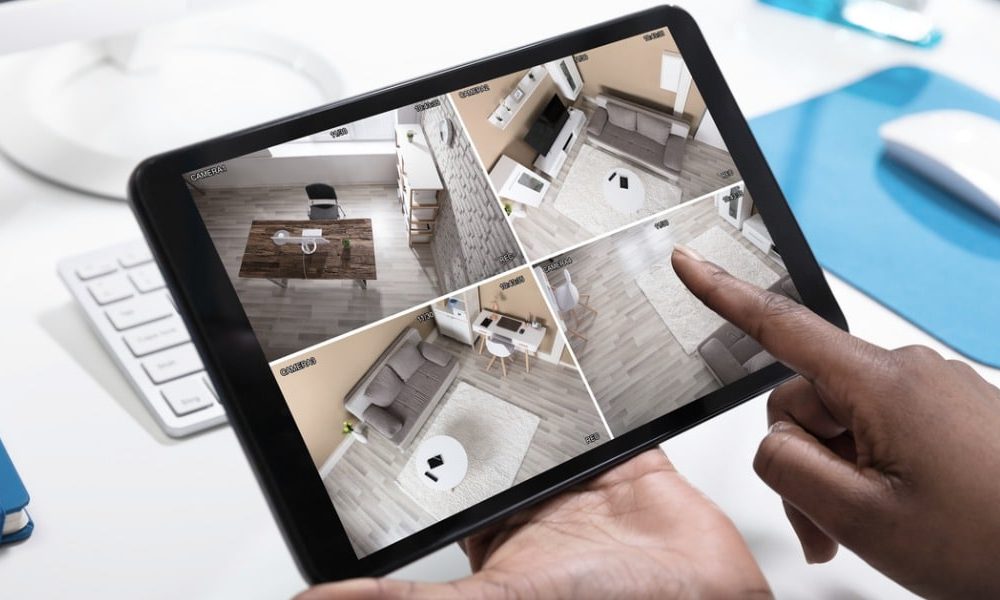 persons-hand-monitoring-cctv-footage-on-tablet-picture-id1150345192-3 persons-hand-monitoring-cctv-footage-on-tablet-picture-id1150345192-3